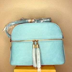 Turquoise bag with tassels